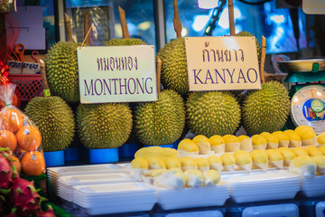 Bangkok, Thailand - April 23, 2017: Organic fruits such as mangosteen, apple, durian and dragon fruit on sale at Or Tor Kor Market, one of the world’s fresh market in Bangkok, Thailand. © kampwit