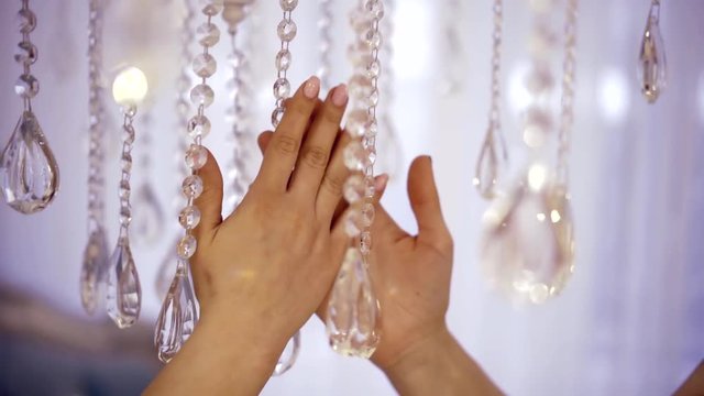 Close-up shot of a lesbians hands slowly getting close, beautiful manicure.