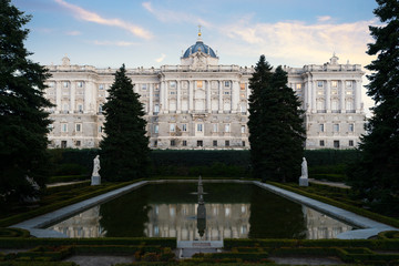 Fototapeta premium Madrid landmark at night. Landscape of Royal Palace and Sabatini gardensat dusk. Historical building at Madrid, Spain.