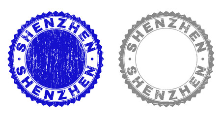 Grunge SHENZHEN stamps isolated on a white background. Rosette seals with grunge texture in blue and grey colors. Vector rubber stamp imprint of SHENZHEN title inside round rosette.