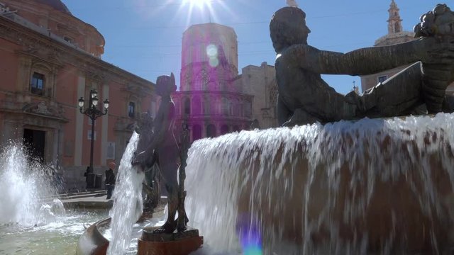 Square of Saint Mary's and fountain Rio Turia in Valencia in a summer day, Spain
