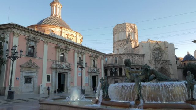 Square of Saint Mary's and fountain Rio Turia in Valencia in a summer day, Spain