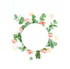 Flowers composition background. frame mockup with roses and eucalyptus branches on white background.  Copy space