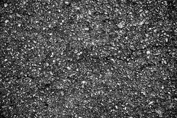 crack and texture of asphalt road - top view background.
