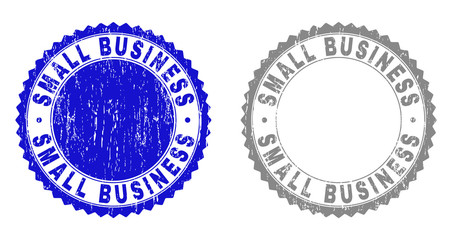 Obraz premium Grunge SMALL BUSINESS stamp seals isolated on a white background. Rosette seals with distress texture in blue and gray colors.