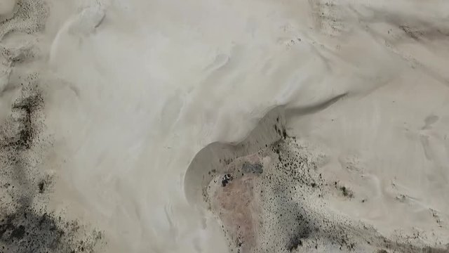 Drone footage of a beach called Barra de Ibiraquera in Imbituba, Brazil.
