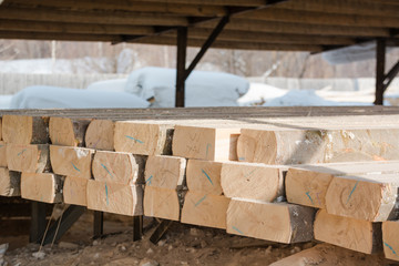 Logs sawn on the boards. Sawing boards. A lot of lumber.