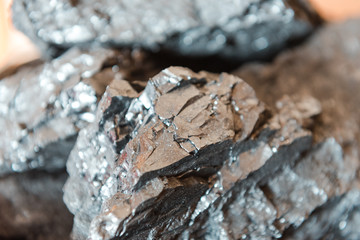 Coal close up. The structure of coal. Fuel for heating. Use the stove. Natural fossil.