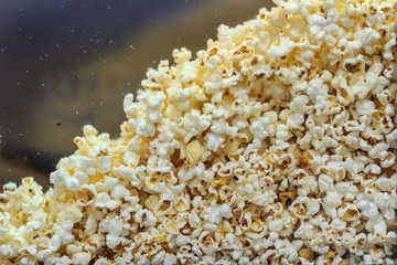Cooked popcorn in the glass showcase for sale.