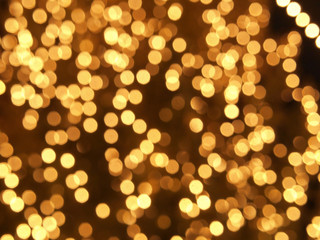 abstract blurred glowing lights of light gold shades