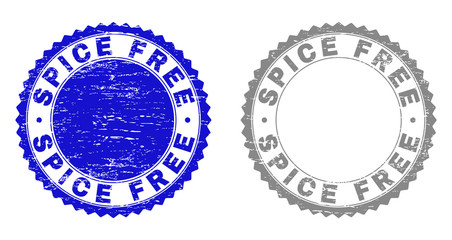 Grunge SPICE FREE stamp seals isolated on a white background. Rosette seals with grunge texture in blue and gray colors. Vector rubber stamp imitation of SPICE FREE title inside round rosette.