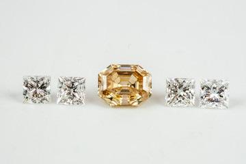 Natural color diamond with princess cut diamonds