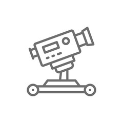 Digital cinema camera on wheels line icon.