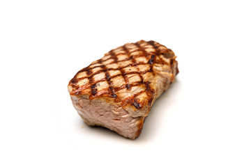 roasted veal fillet, young beef meat isolated on a white background