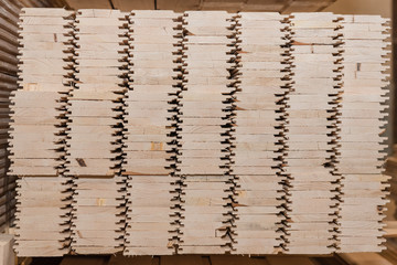 Lumber butts. Boards clad in piles. Euro race, blockhouse, timber emitation.