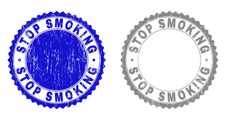 Grunge STOP SMOKING stamp seals isolated on a white background. Rosette seals with grunge texture in blue and gray colors. Vector rubber watermark of STOP SMOKING label inside round rosette.