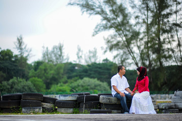 A romatic loving couple at park in Malaysia