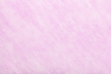 Light purple background of felt fabric. Texture of woolen textile