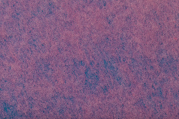 Dark purple background of felt fabric. Texture of woolen textile