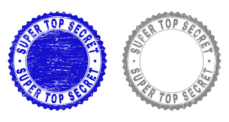 Grunge SUPER TOP SECRET watermarks isolated on a white background. Rosette seals with grunge texture in blue and gray colors.
