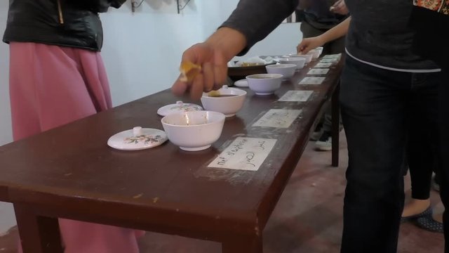 Tourist people are tasting various sorts of ecological honey in Morocco workshop