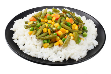 black plate with white rice, green peas, canned corn kernels, cut green beans isolated on white background