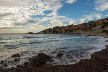 The bay of hort in ibiza at sunset
