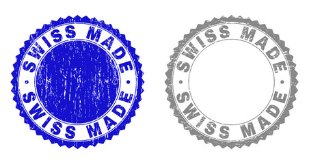 Grunge SWISS MADE stamp seals isolated on a white background. Rosette seals with grunge texture in blue and grey colors. Vector rubber stamp imitation of SWISS MADE caption inside round rosette.