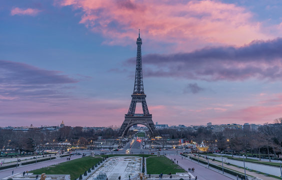 The Eiffel Tower With Blue And Purple Sky In Paris, France