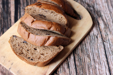 Homemade Chocolate Chip Banana Bread Cut On the Wood