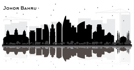 Obraz premium Johor Bahru Malaysia City Skyline Silhouette with Black Buildings and Reflections.