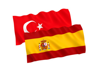 National fabric flags of Turkey and Spain isolated on white background. 3d rendering illustration. 1 to 2 proportion.