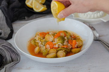 Brussels sprouts with olive oil, lemon ,carrots and rice