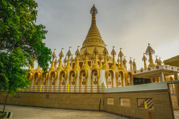 Beautiful golden pagodas in the center of Vipasana practice. Kanpur, India