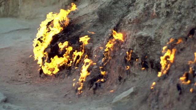 Natural burning ground. Burning natural gas from underground.