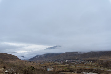 mountains in clouds. the cloud between the peaks of the mountains. Caucasian mountain area. panoramic view