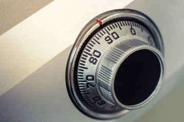 Close-up of a combination dial on a safe