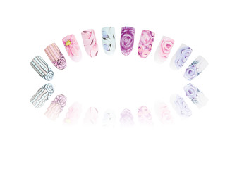 Beautiful nail art on woman tips beauty nails. Nail polish in different fashion colors.