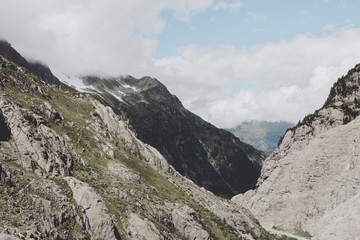 Closeup mountains scenes, walk to Trift Bridge in national park Switzerland