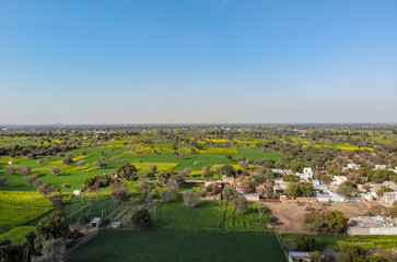 Naklejka premium Aerial view of a village and farms