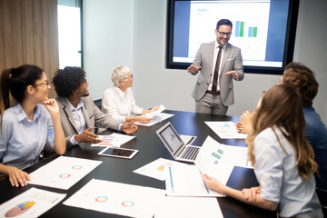 Creative business people working on business project