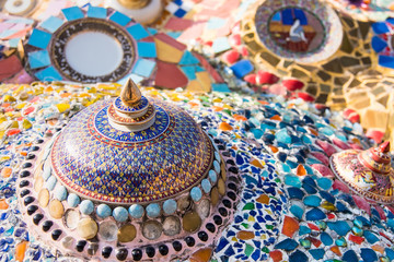 Sculpture decorative on cement wall ,using glass and ceramic at the Wat-Pha-Kaew, Phetchabun Province, Thailand.