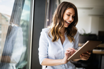 Successful business woman looking confident and smiling