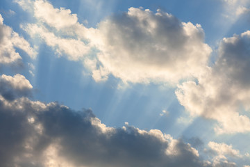 Clouds and sunrays at sunrise