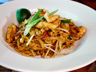 Pad Thai chicken, Thai food Korat's stir fried noodle. This is traditional menu from Korat (province in Thailand). Pad Mee Korat, Thai local food, Fried noodle bean sprout.