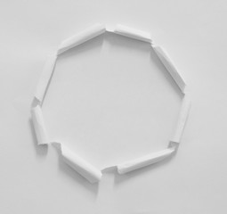 Torn paper background, empty space for text.
