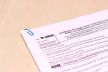close Up of USA Tax Form type W-8BEN, certificate of foreign status of beneficial owner for united states tax withholding