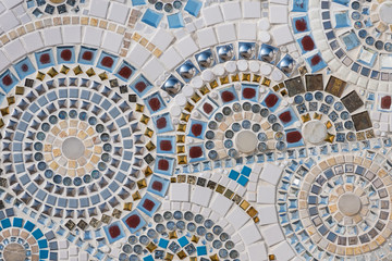 Sculpture decorative on cement wall ,using glass and ceramic at the Wat-Pha-Kaew, Phetchabun Province, Thailand.