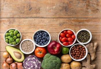 Healthy eating ingredients: fresh vegetables, fruits and superfood. Nutrition, diet, vegan food concept