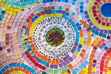 Sculpture decorative on cement wall ,using glass and ceramic at the Wat-Pha-Kaew, Phetchabun Province, Thailand.